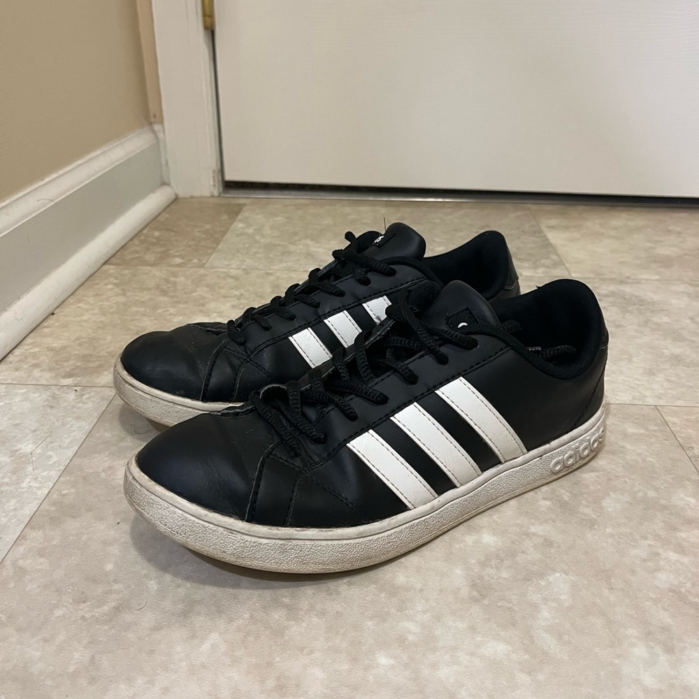 Black Adidas sneakers